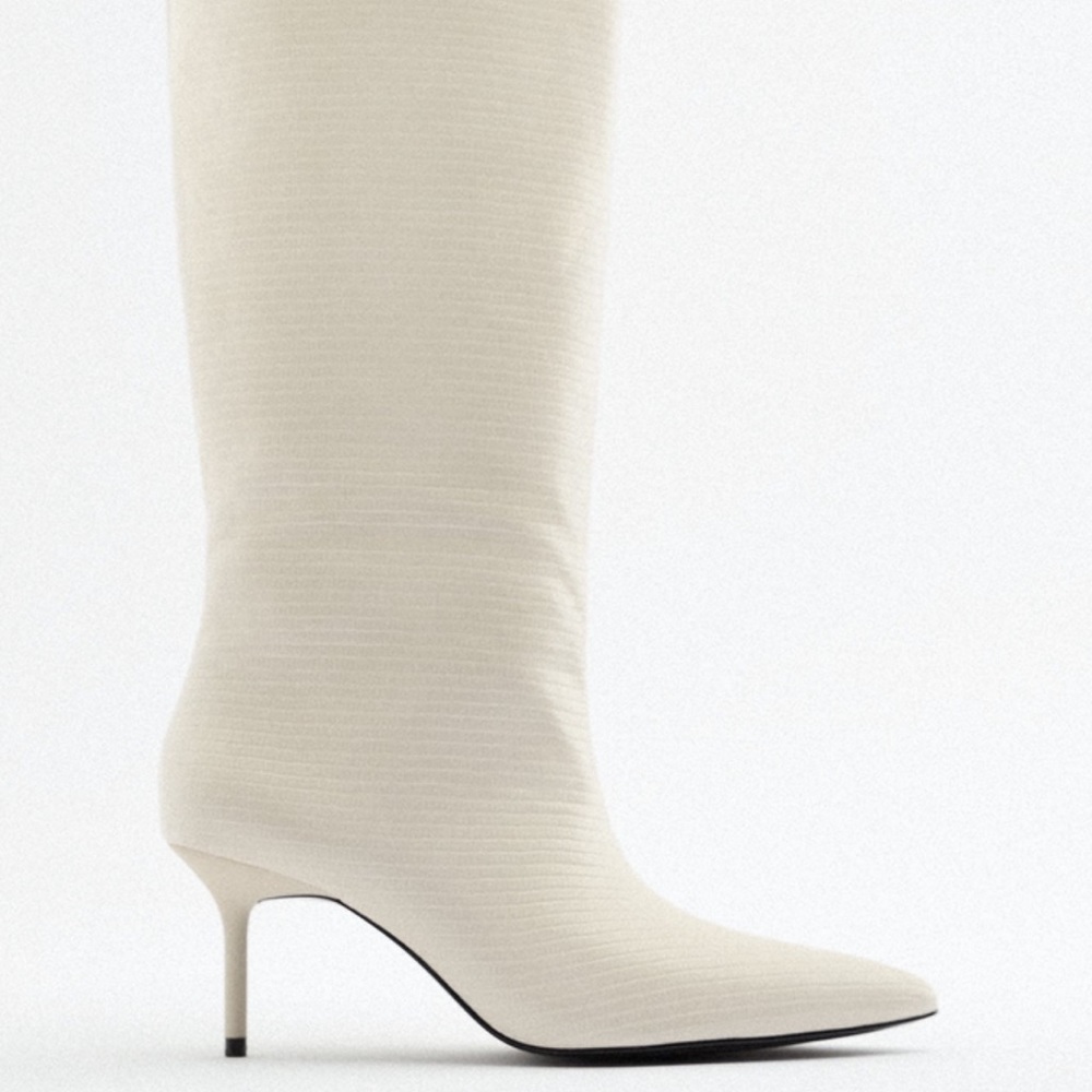 White pointed toe knee high boots